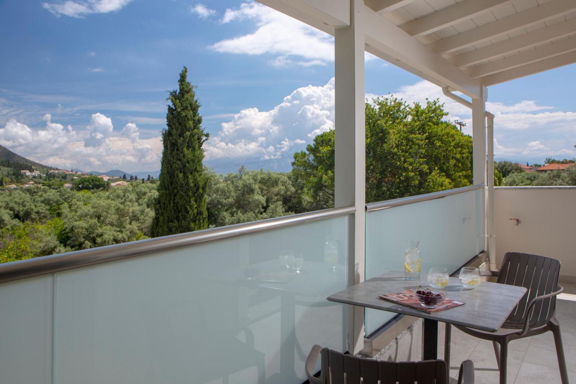 Zisis Suites Нідрі Номер фото